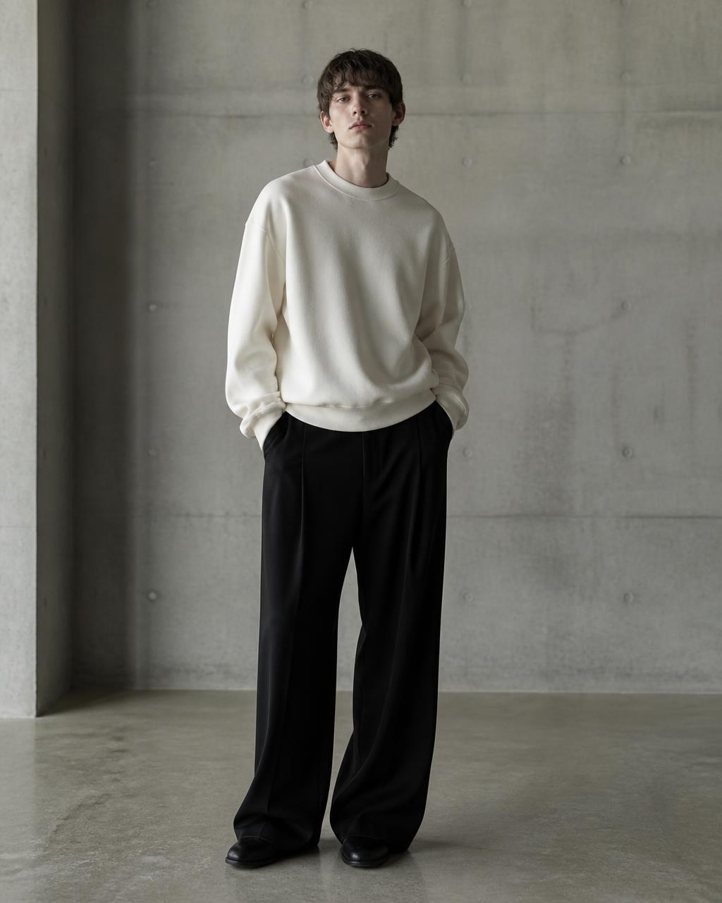 Model wearing the Susudio Heavy Crewneck from the FW 26/27 collection