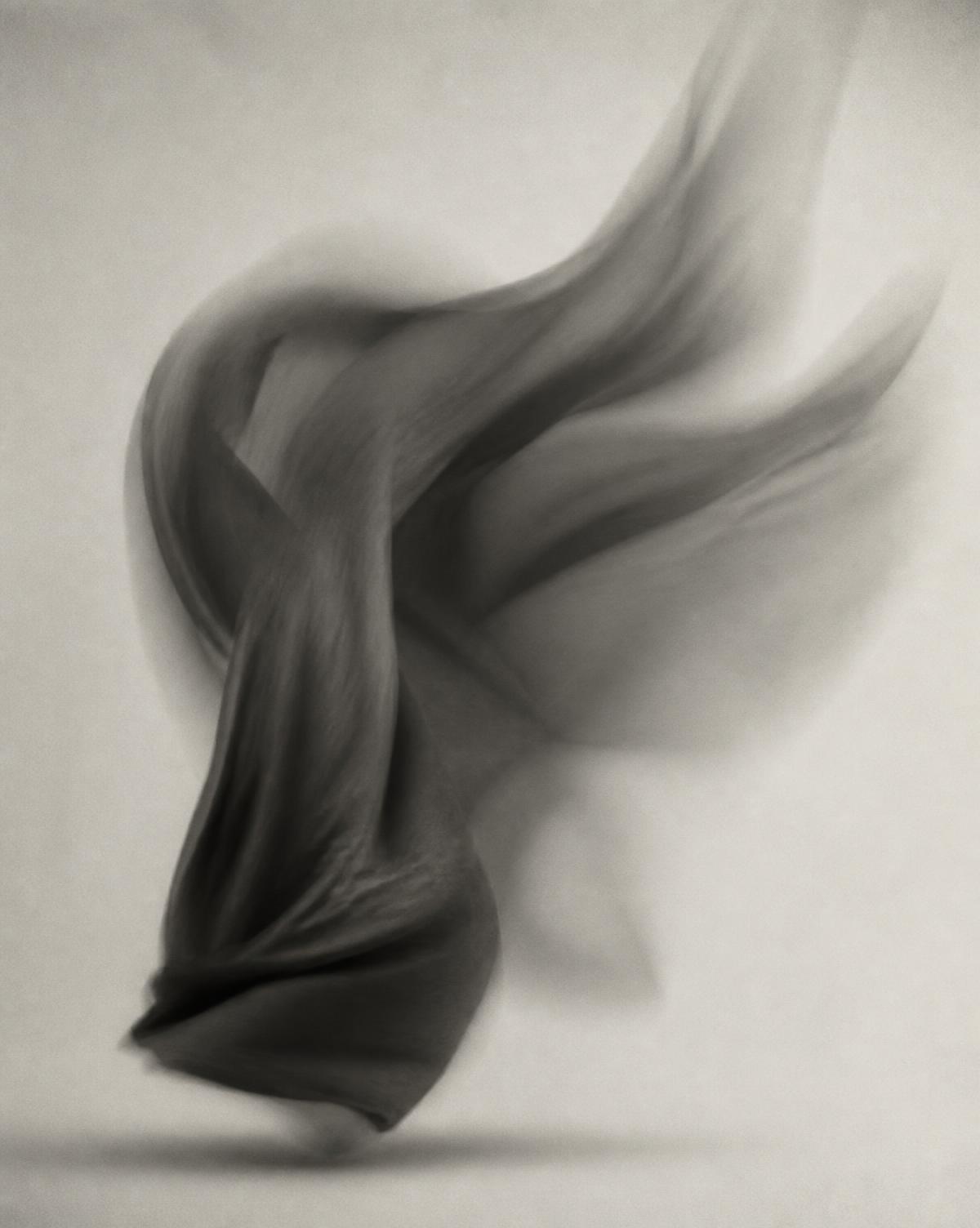 Long-exposure study of heavy Susudio fabric in movement